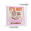 Pink embroidered patch with text saying It's Not Easy Being A Cowgirl But If The Boots Fit