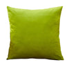 A square velvet throw pillow cover in a vibrant lime green color.