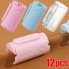 A set of 12 pink and light blue non-slip bed sheet grippers with adjustable clips shown in various angles.