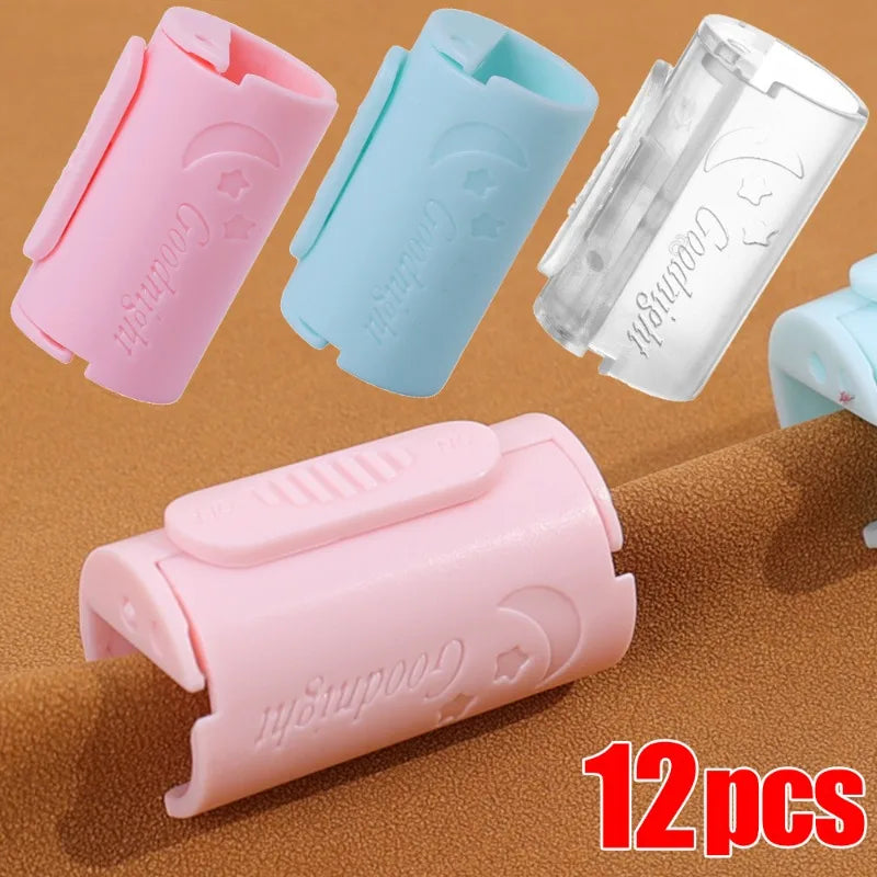 A set of 12 pink and light blue non-slip bed sheet grippers with adjustable clips shown in various angles.