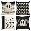Set of four Halloween cushion covers featuring ghost, pumpkin, and skull designs on black and white backgrounds.