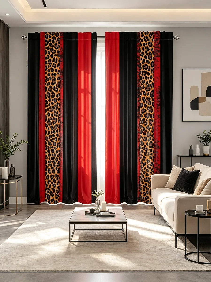 A set of two floor-length curtains featuring a black and red fabric with a leopard print pattern, hanging in a modern room.