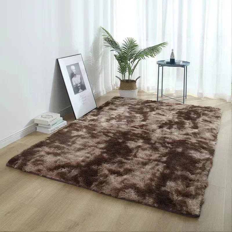A dark brown thick silk wool area rug placed on a light wood floor in a bright room.