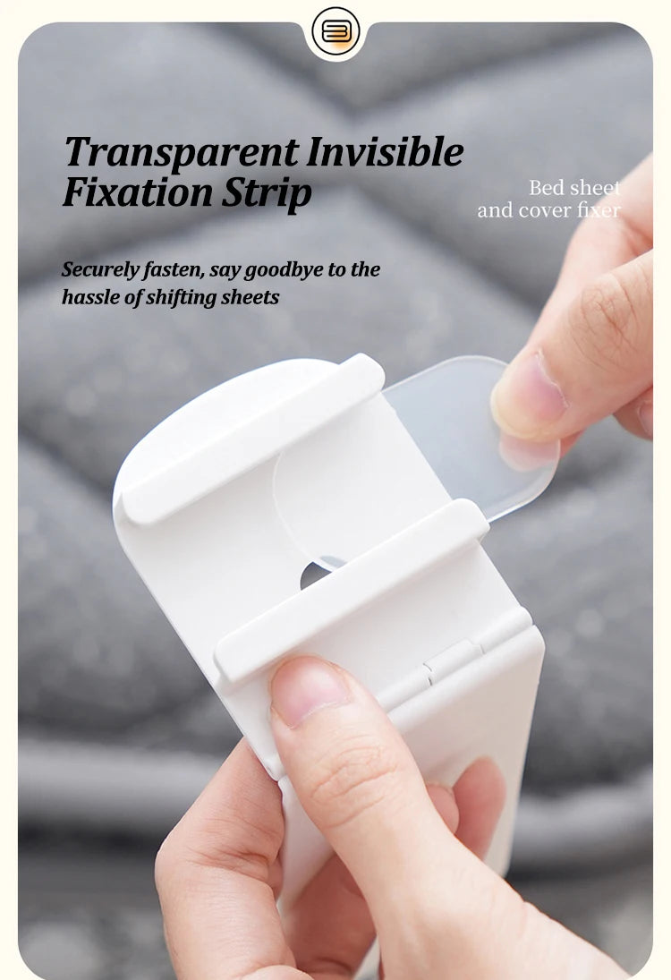A hand is using a transparent invisible fixation strip to secure bed sheets and covers.