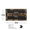 A rectangular camouflage patch featuring the German flag design with an eagle shield emblem.