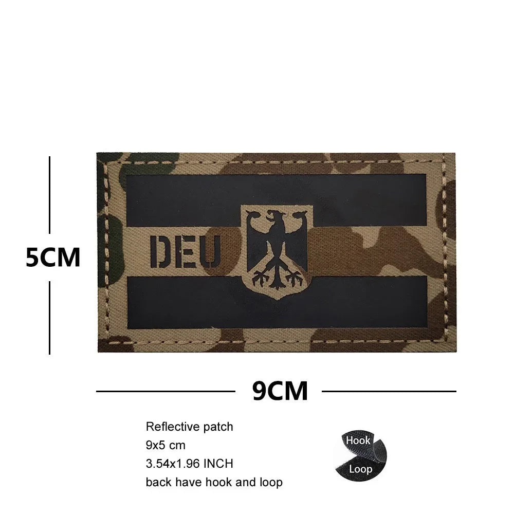 A rectangular camouflage patch featuring the German flag design with an eagle shield emblem.