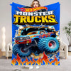 A colorful poster featuring a monster truck driving through flames and debris.