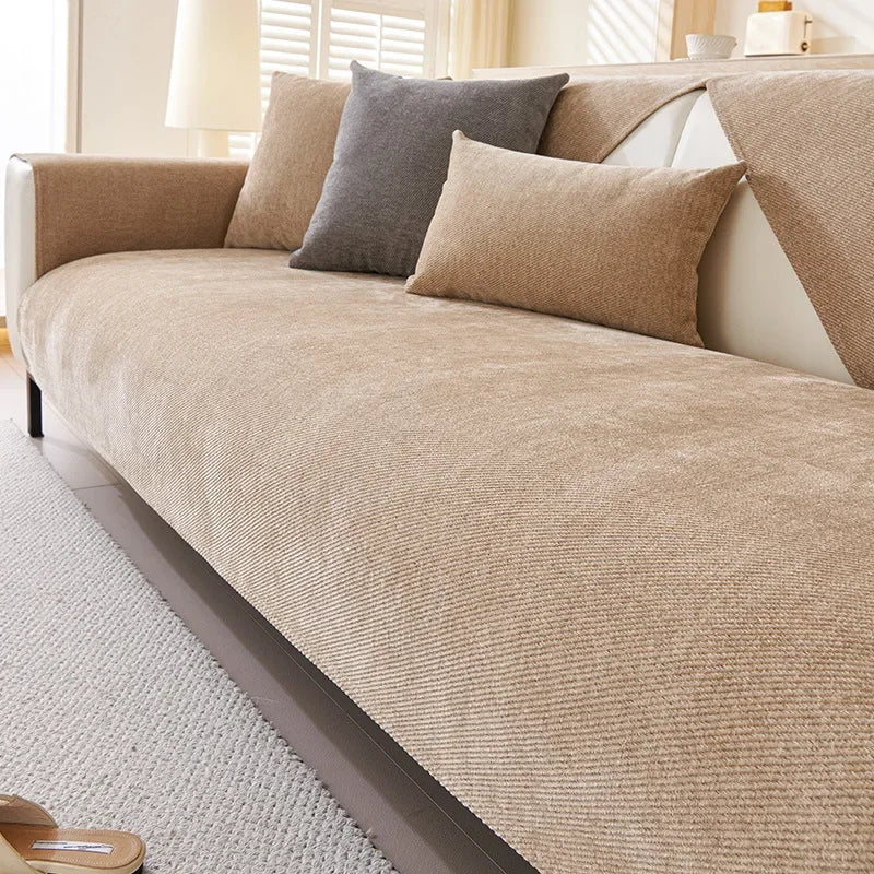 A beige chenille sofa cushion cover displayed on a light-colored sofa with neutral accent pillows.