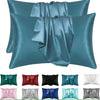 A collection of satin silk pillow covers in various shades including teal, blue, green, pink, and gray.