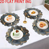 A set of six dark blue floral non-slip placemats with gold accents and white plates for modern dining.
