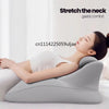 A woman is relaxing with an ergonomic memory foam wedge pillow for gastric comfort, demonstrating a neck stretch.