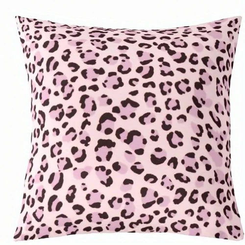 A square decorative pillow cover with a pink leopard print pattern.