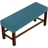 A teal upholstered elastic stool cover with a wooden frame for living room seating.