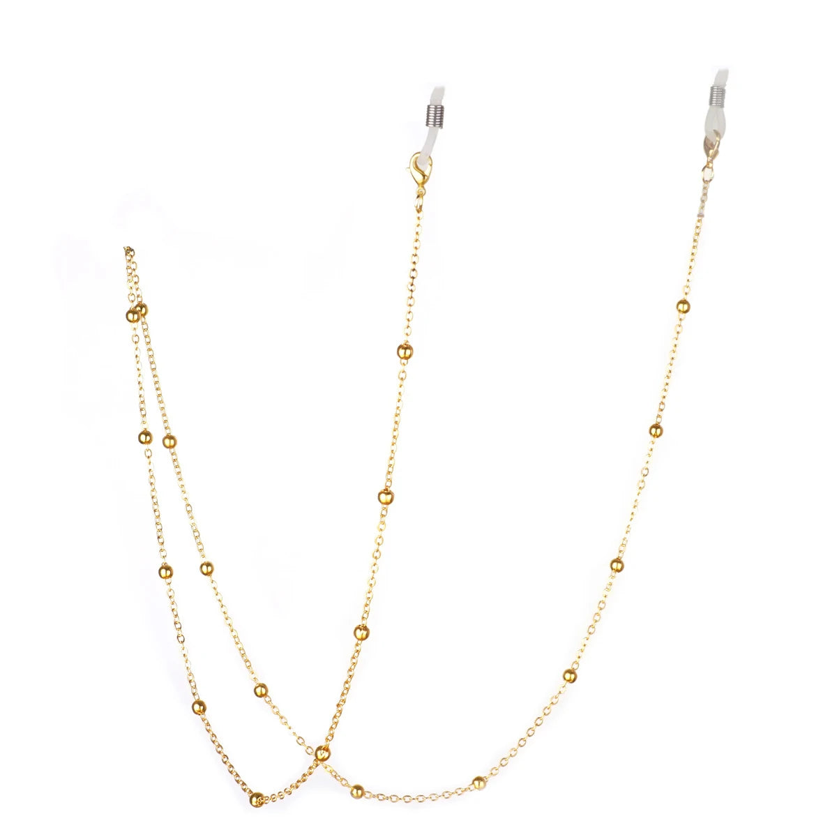 A delicate gold-colored locket necklace with a chain and a moon charm.