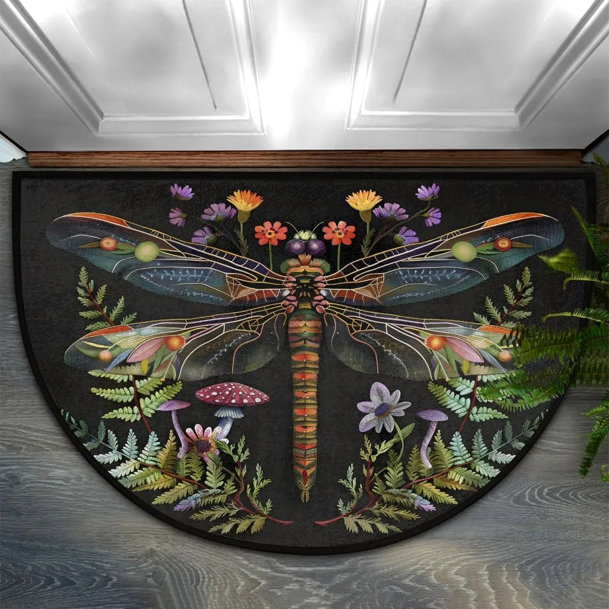 A dark rug featuring a whimsical floral design of dragonflies and greenery.