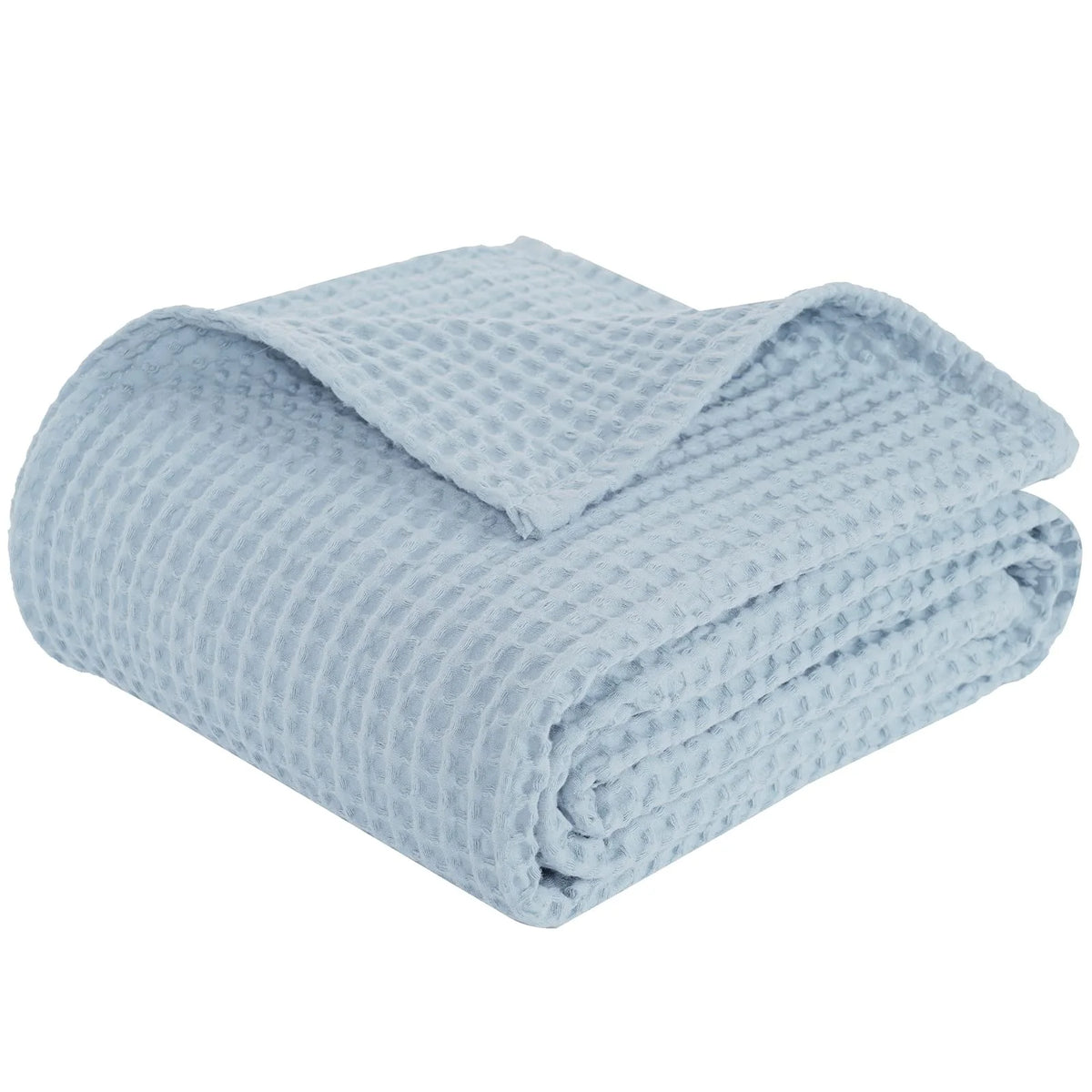 Light blue waffle textured blanket folded and draped