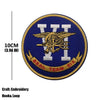 Navy blue embroidered armband patch featuring Roman numeral VI and the text SEAL TEAM SIX