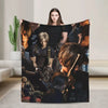 A graphic throw blanket featuring a collage of characters from the show Breaking Bad.
