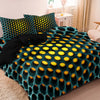 A teal duvet cover set featuring a yellow polka dot hole pattern on a light wood surface.