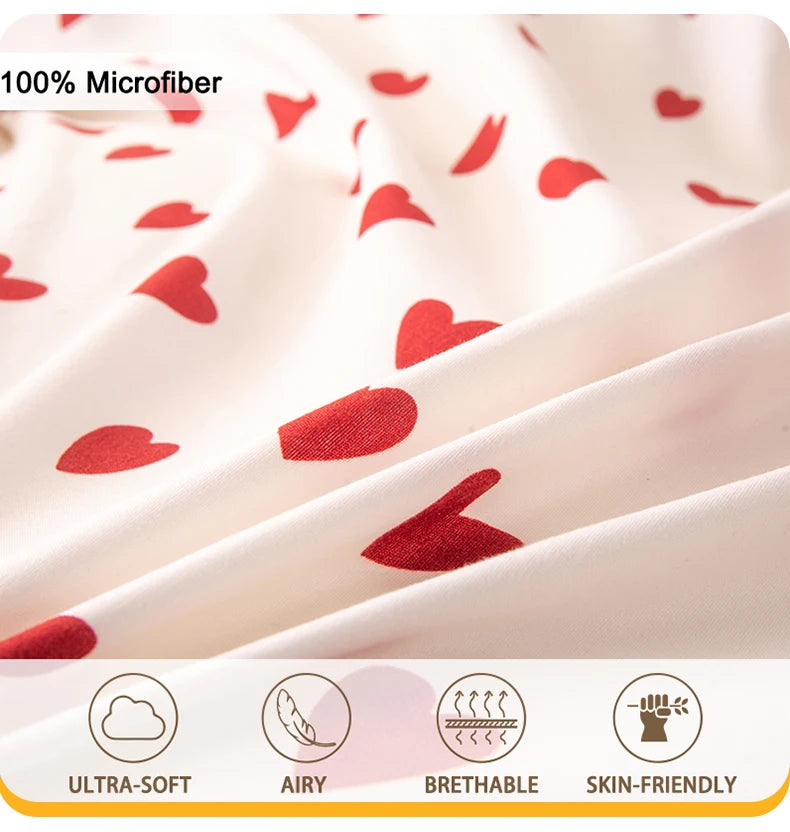 Close-up of a white microfiber fabric with red heart prints, showing soft texture and breathable material.
