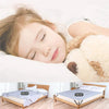 A young girl is resting her head on a fluffy teddy bear toy, demonstrating the use of adjustable bed sheet grippers.