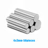 50 pieces of 4x2mm silver magnetic fridge magnets stacked together