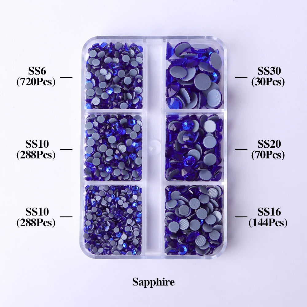 A clear plastic container holds various sizes of purple sapphire glass rhinestones categorized by SS6, SS10, SS16, SS20, and 