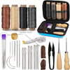 A professional leather craft stitching tool kit showing spools of waxed thread, needles, and various leather tools.