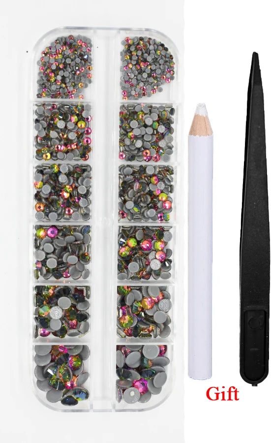 A clear plastic container holds various colors and sizes of crystal hot fix rhinestones and an applicator tool.