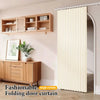 A light beige folding door curtain installed on a rod, shown next to wooden shelving and cabinetry.