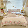 A set of three pieces including a duvet cover, two pillowcases, and a pillow core with a lavender print design.