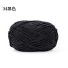 A ball of black 3mm matte chenille yarn for knitting and crochet.