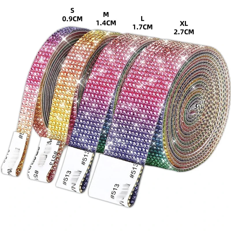 Roll of self-adhesive crystal rhinestone ribbon in various sizes and colors, showing different lengths from S to XL.