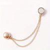 Gold chain necklace with a round pendant and a small circular charm