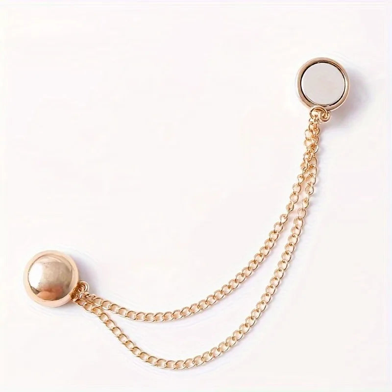 Gold chain necklace with a round pendant and a small circular charm