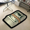 A close-up of a decorative floor rug featuring a depiction of US currency.