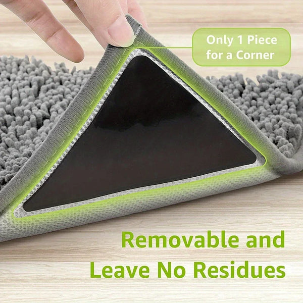 A close-up of a reusable non-slip rug gripper designed for corners, showing its triangular shape and removable design.
