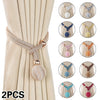 Set of two decorative rope pearl curtain tiebacks featuring various colored beads and knots