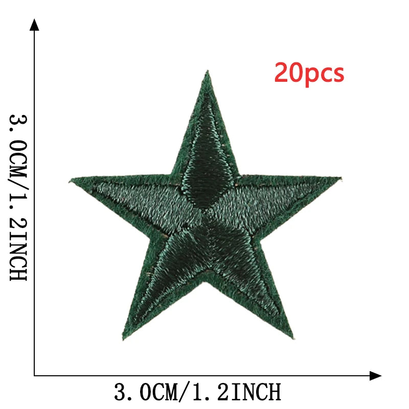 A dark green five-pointed star embroidery patch shown against a measurement scale.