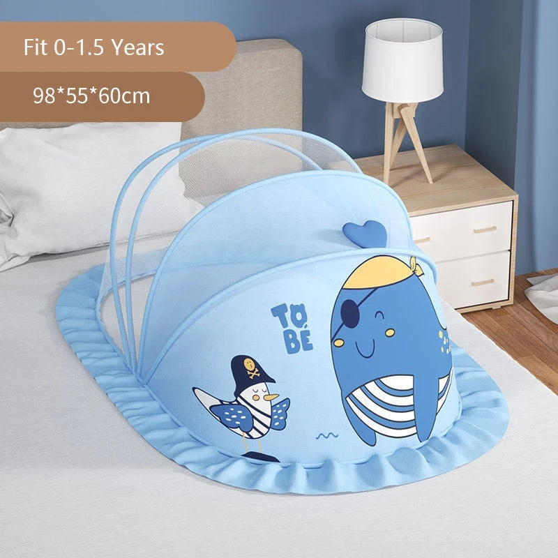 A light blue foldable mosquito net shaped like a cute blue whale for infant cribs.