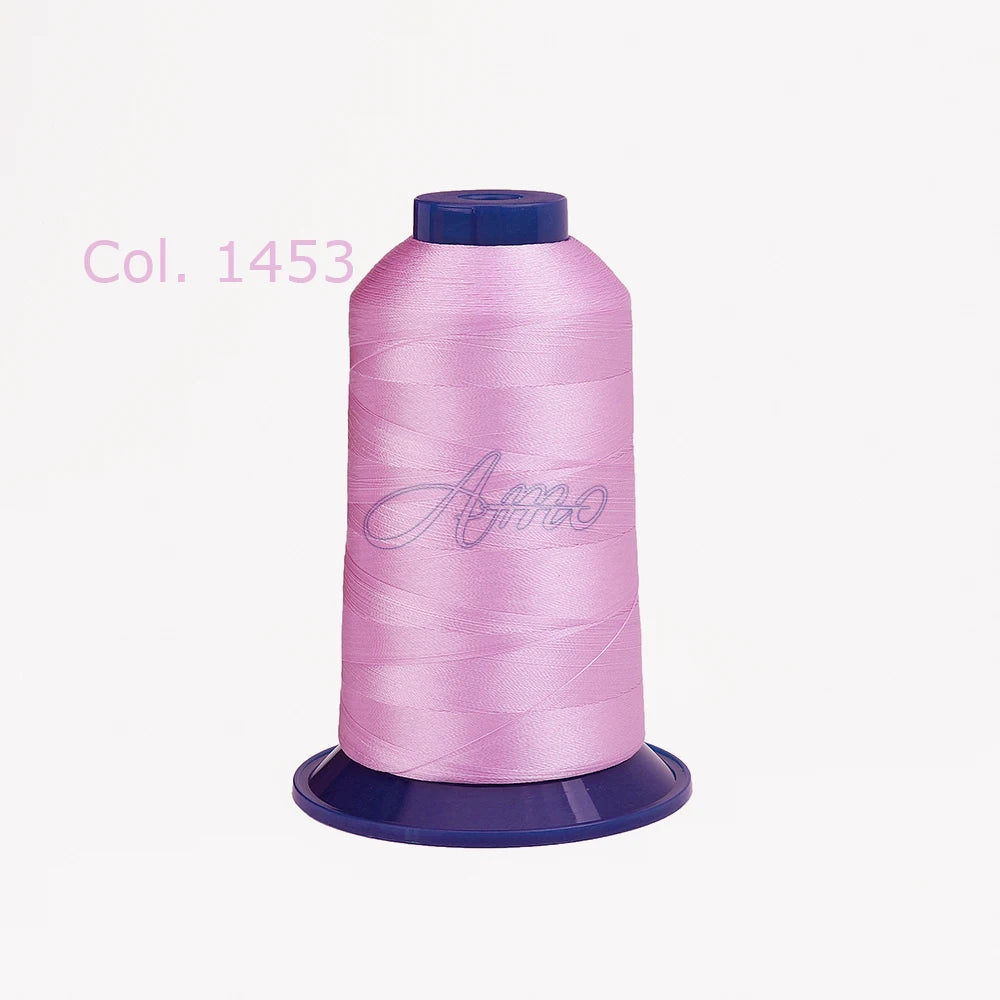 A spool of pink embroidery thread labeled Col. 1453