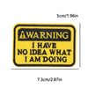 Yellow embroidery patch with black text warning I have no idea what I am doing