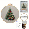Embroidery DIY Art Kit featuring a Christmas tree design on a canvas with tools and thread.