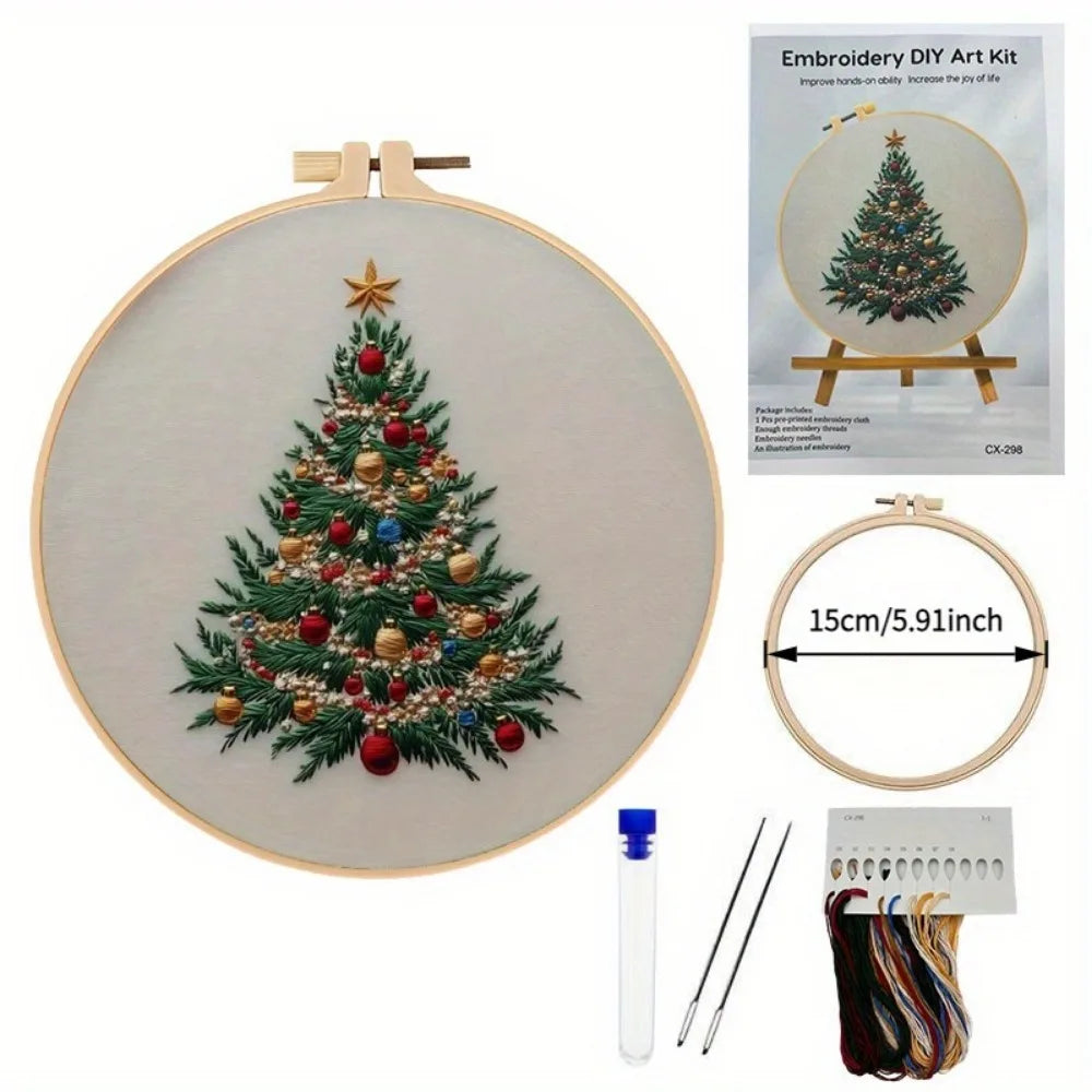 Embroidery DIY Art Kit featuring a Christmas tree design on a canvas with tools and thread.