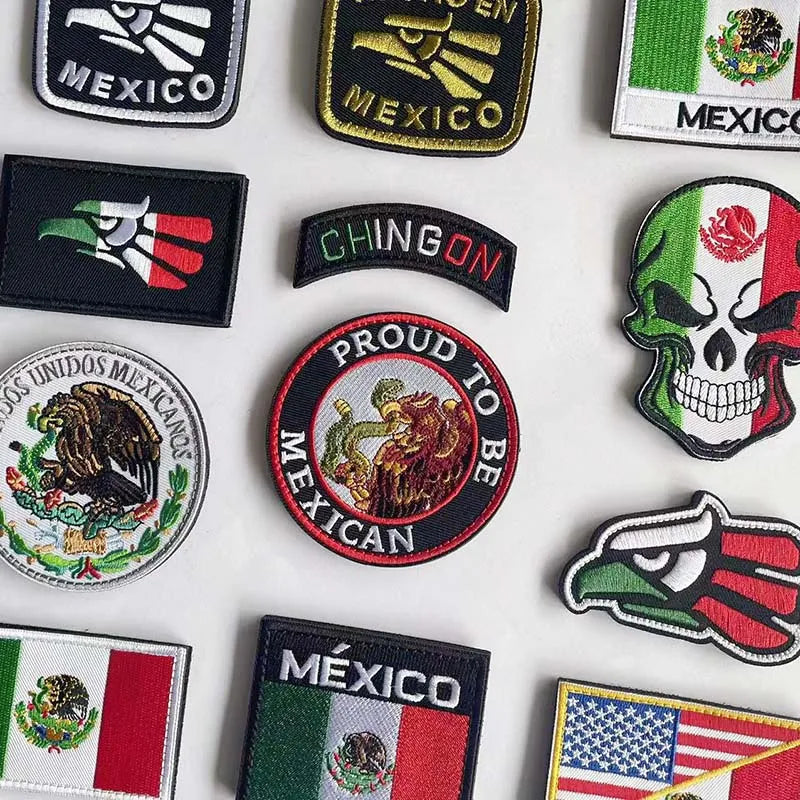 A collection of tactical patches featuring the Mexican flag, eagle, and skull design.