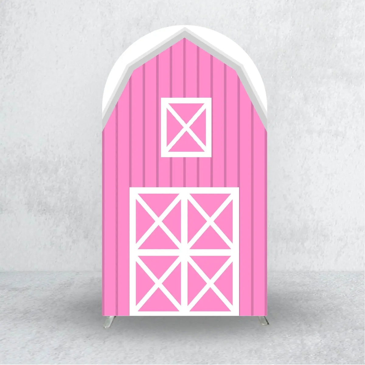 A pink wooden barn-style arch backdrop cover with white cross patterns for events.