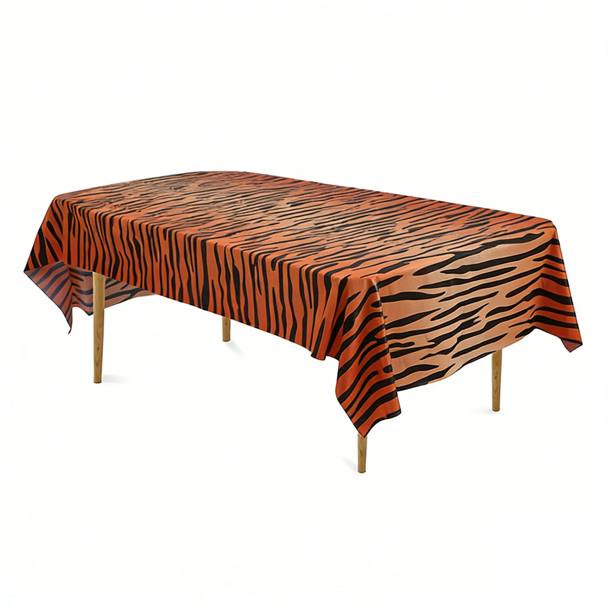 Orange and black zebra print disposable plastic tablecloth spread over a wooden table.