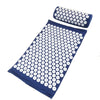 A dark blue acupressure relief mat and pillow set with white domes for pain and stress relief.