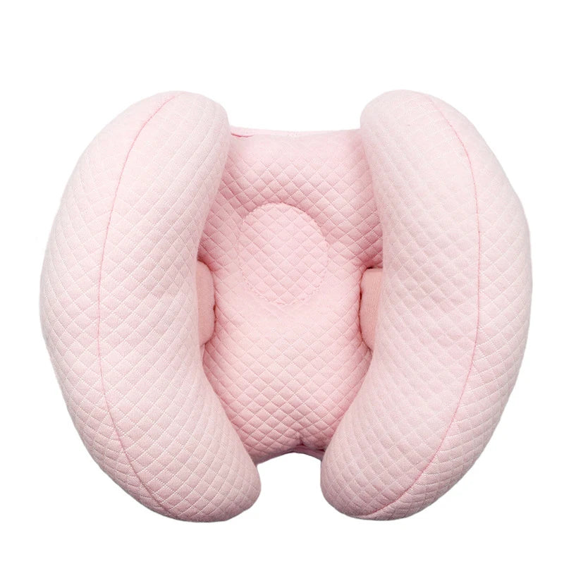 Pink quilted baby head and neck support pillow for strollers and car seats