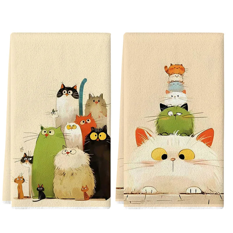 A set of two soft kitchen towels featuring cute cats in various poses and colors.